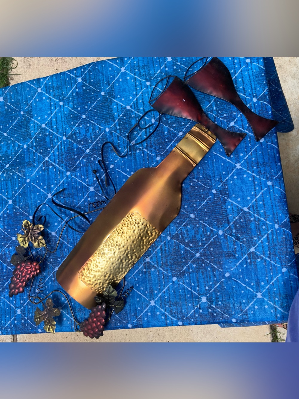 Kirklands Metallic Gold & Bronze Wine Bottle Wall Art on Blue